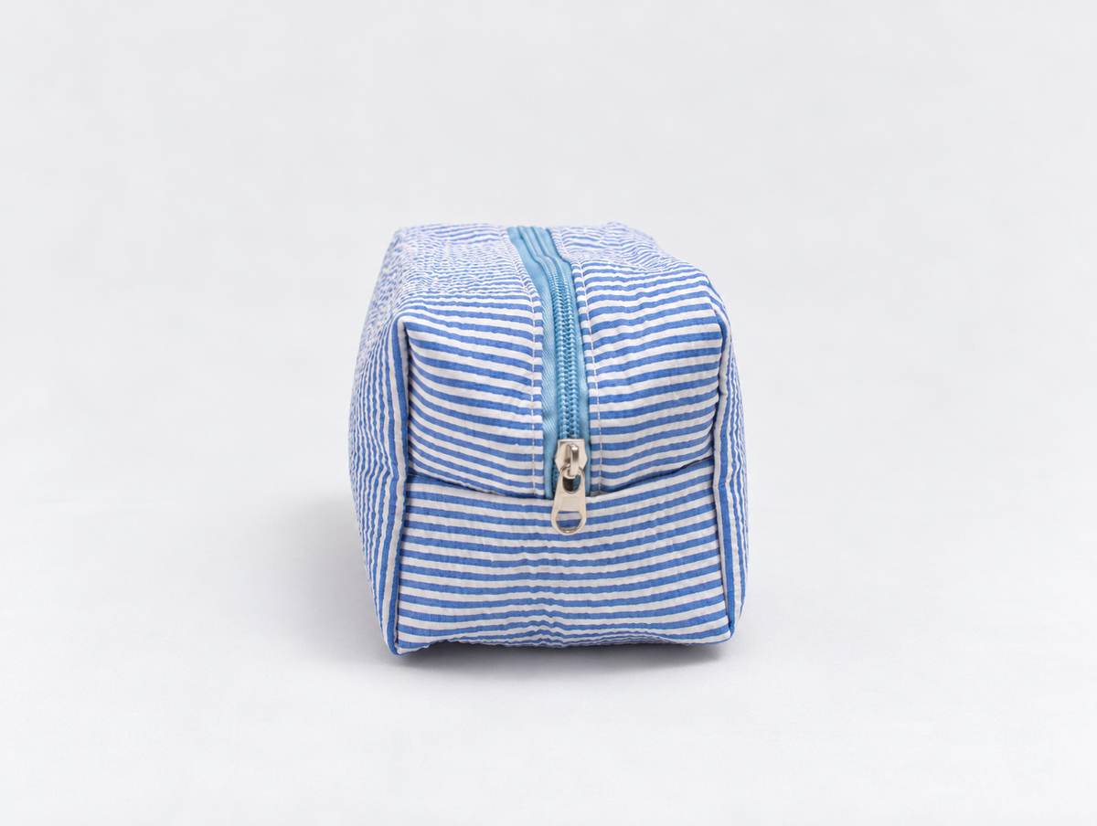 Seersucker Bow Makeup Bag in Blue Stripe, side zip