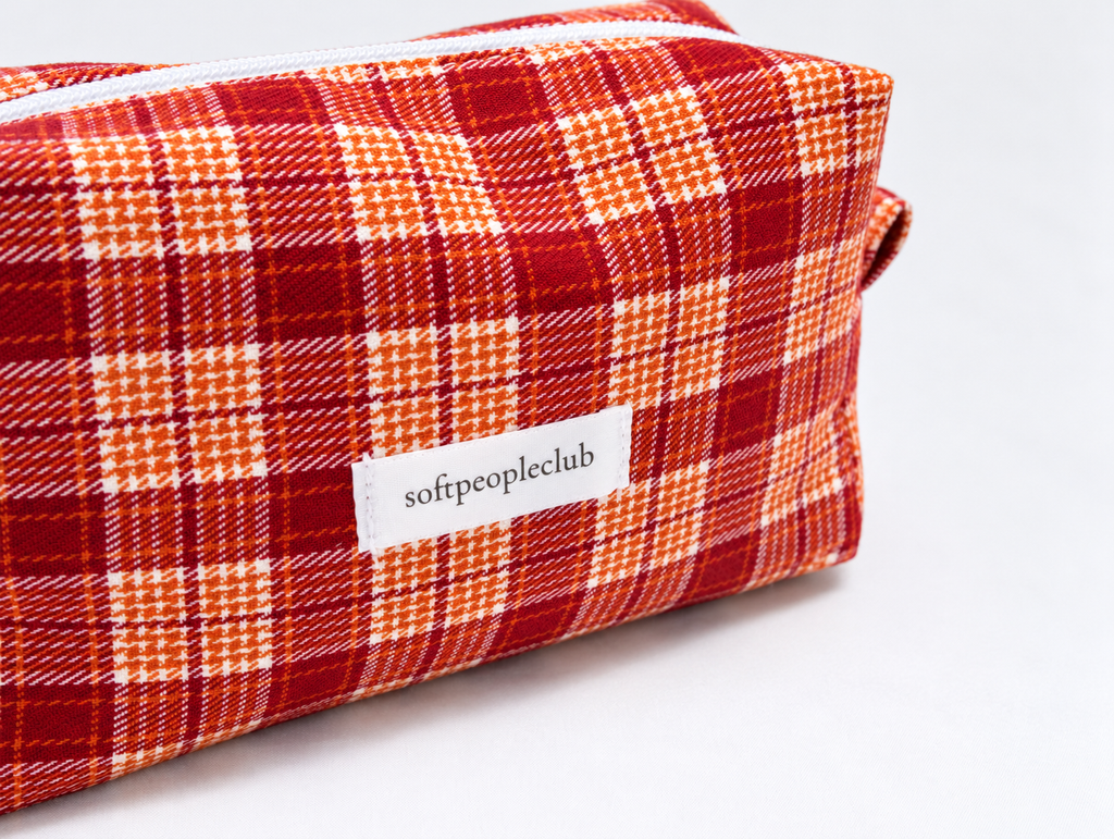 Plaid Makeup Bag in Red Plaid, label detail