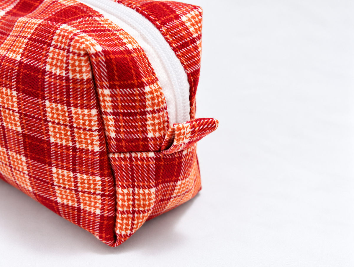 Plaid Makeup Bag in Red Plaid, end tab detail