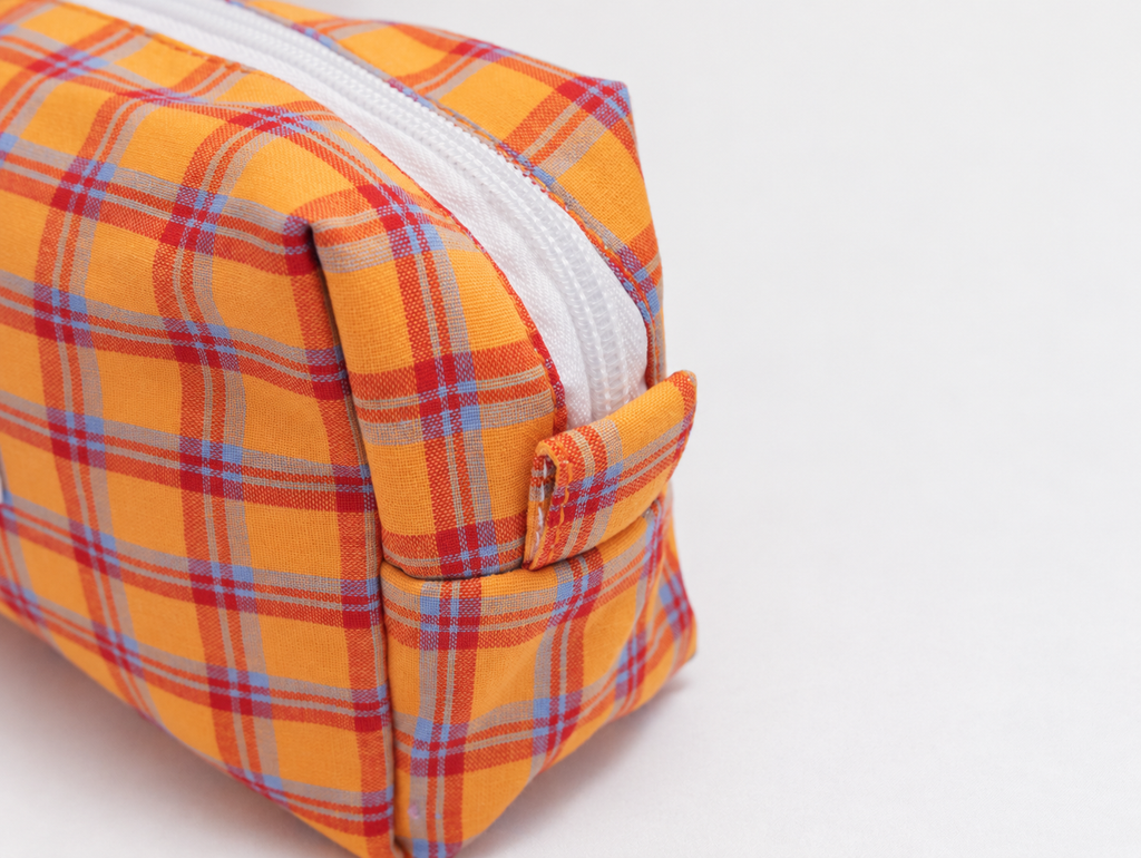 Picnic Check Makeup Bag in Orange Check, end tab detail