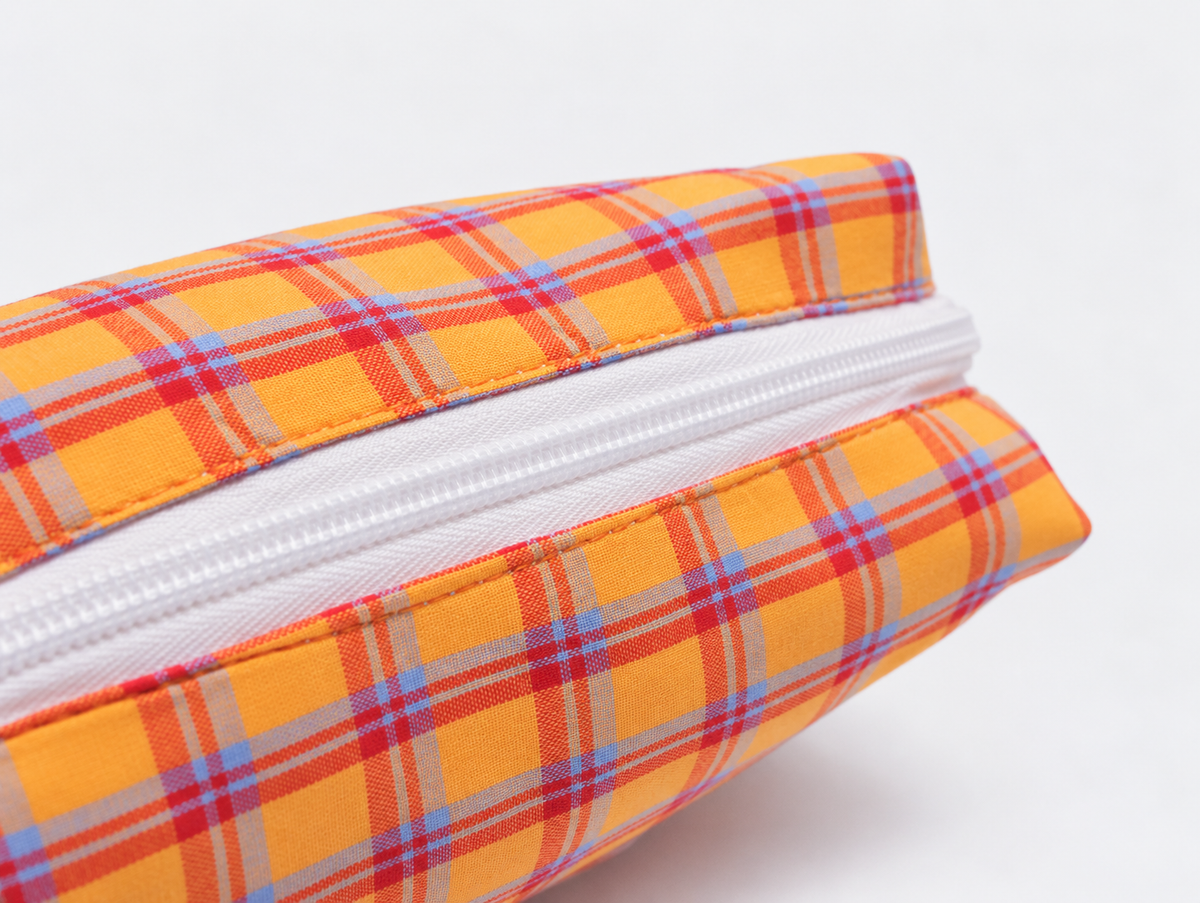Picnic Check Makeup Bag in Orange Check, top zip detail