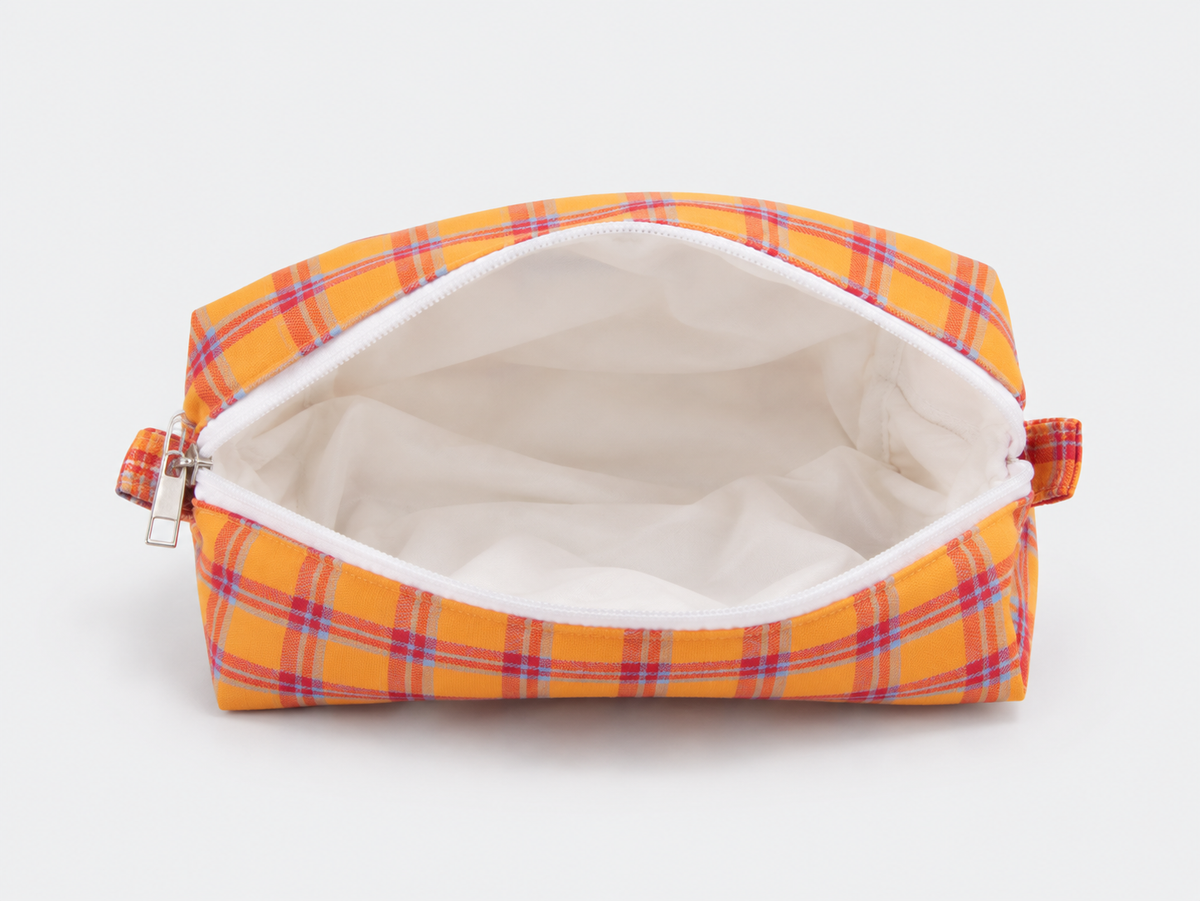 Picnic Check Makeup Bag in Orange Check, open with white lining