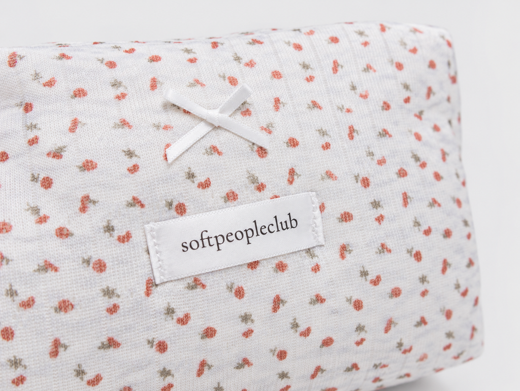 Padded Ditsy Floral Makeup Bag, bow and label detail