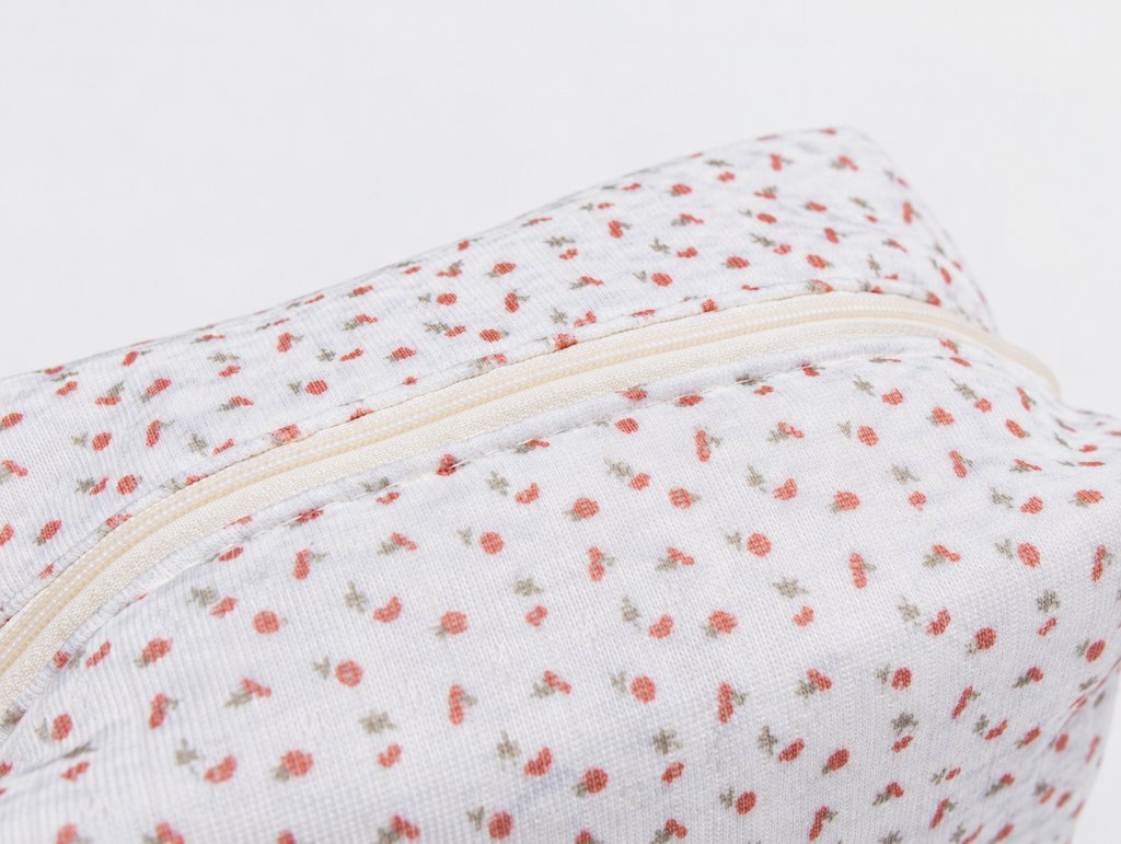 Padded Ditsy Floral Makeup Bag, top zip and print detail
