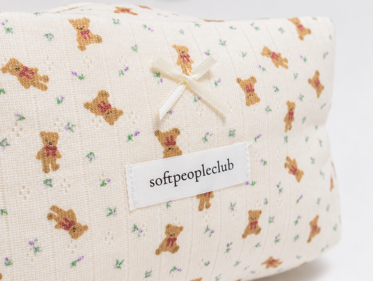 Padded Teddy Makeup Bag, bow and label detail