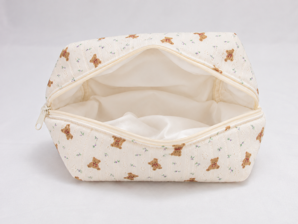 Padded Teddy Makeup Bag, open with cream lining