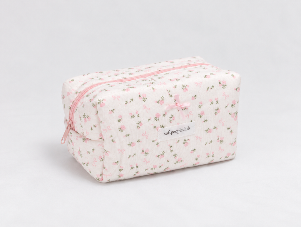 Padded Rose & Bow Makeup Bag, angled view