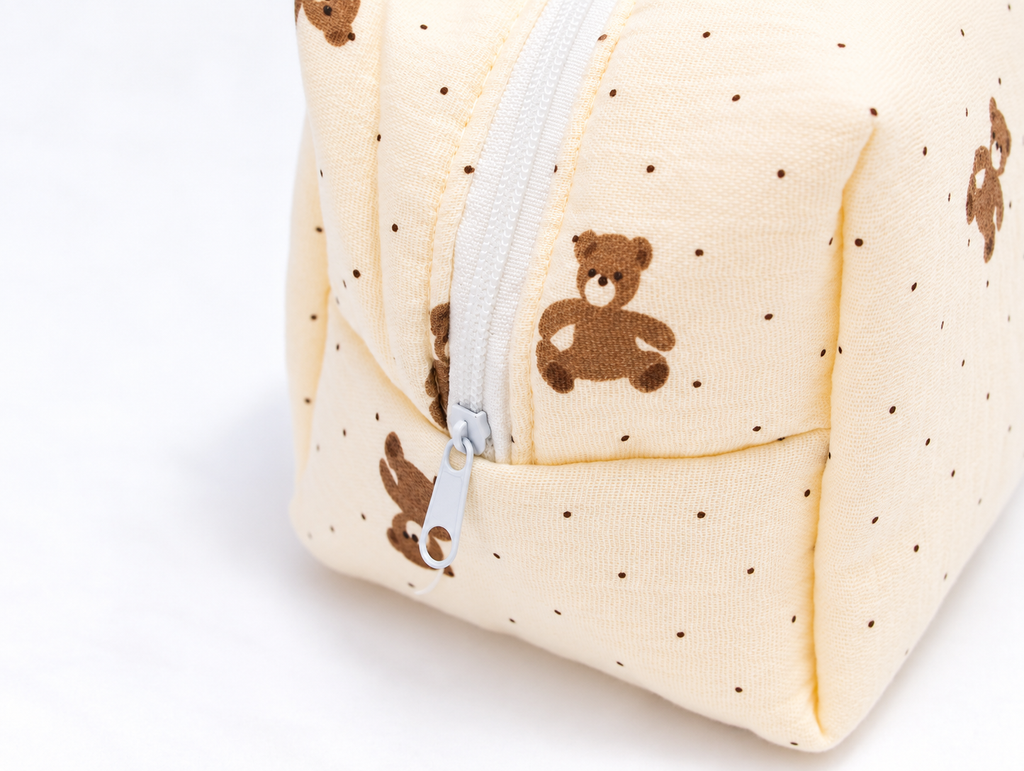 Padded Teddy Dot Makeup Bag, zip pull detail