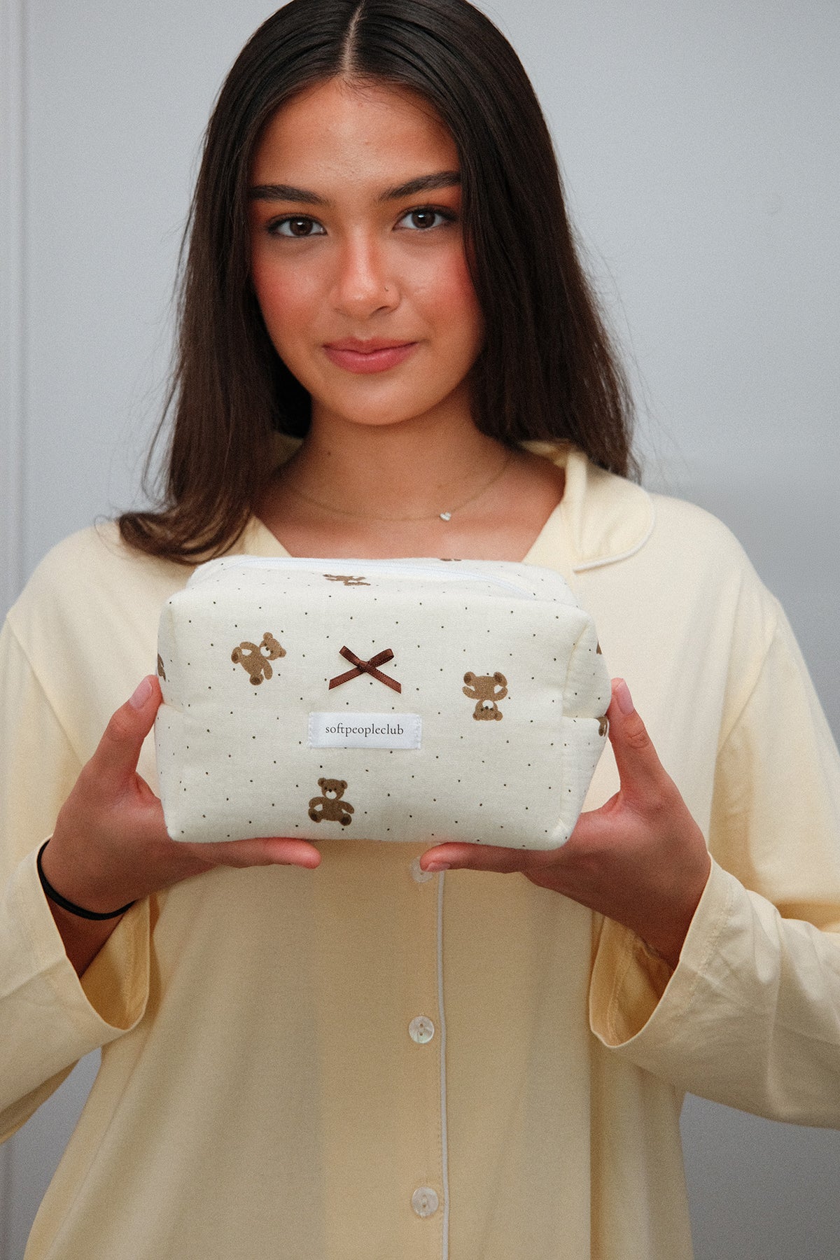 Padded Teddy Dot Makeup Bag, held by model