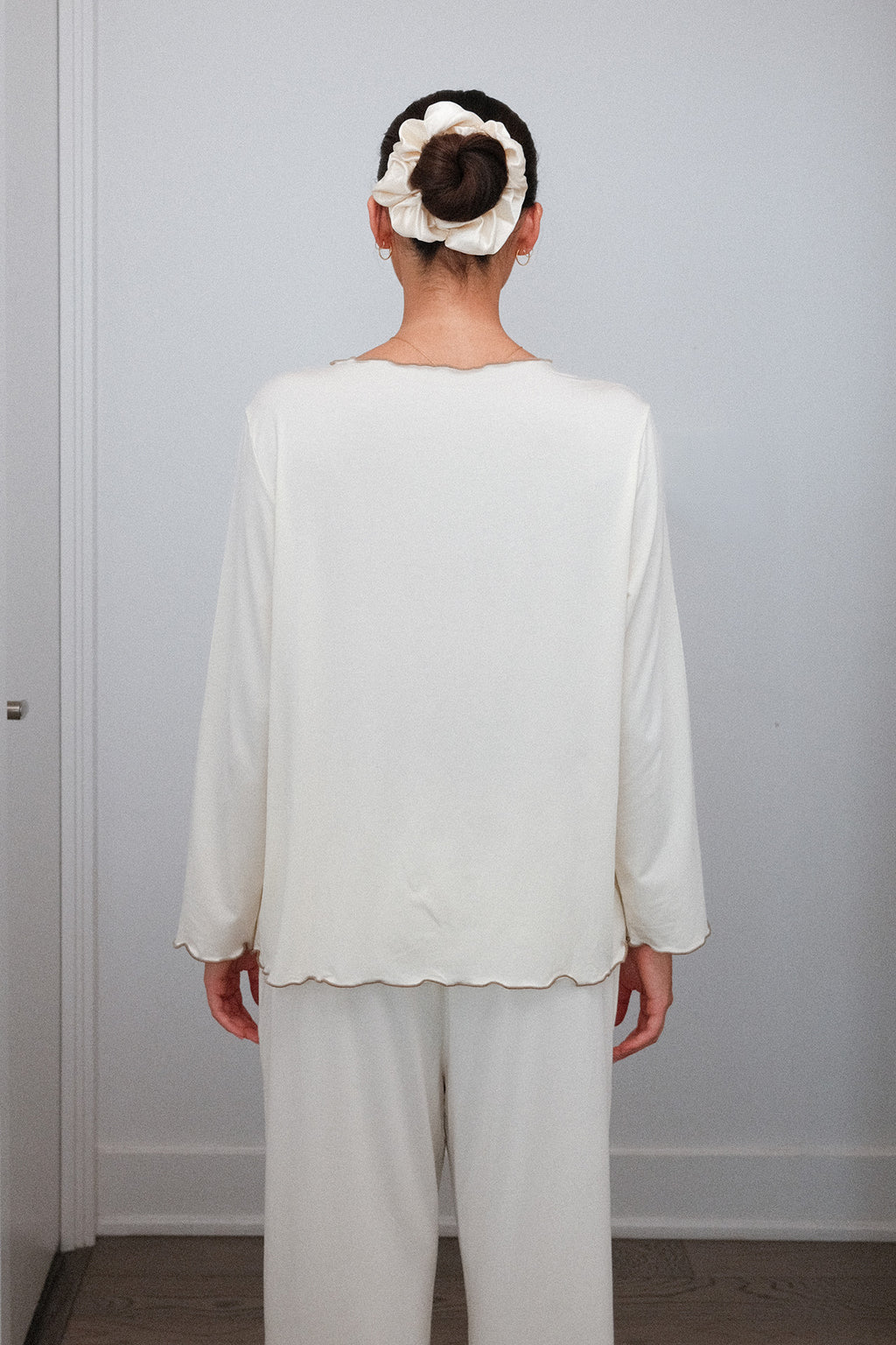 Ruffle Trim Pajama Set in Cream, on model, back