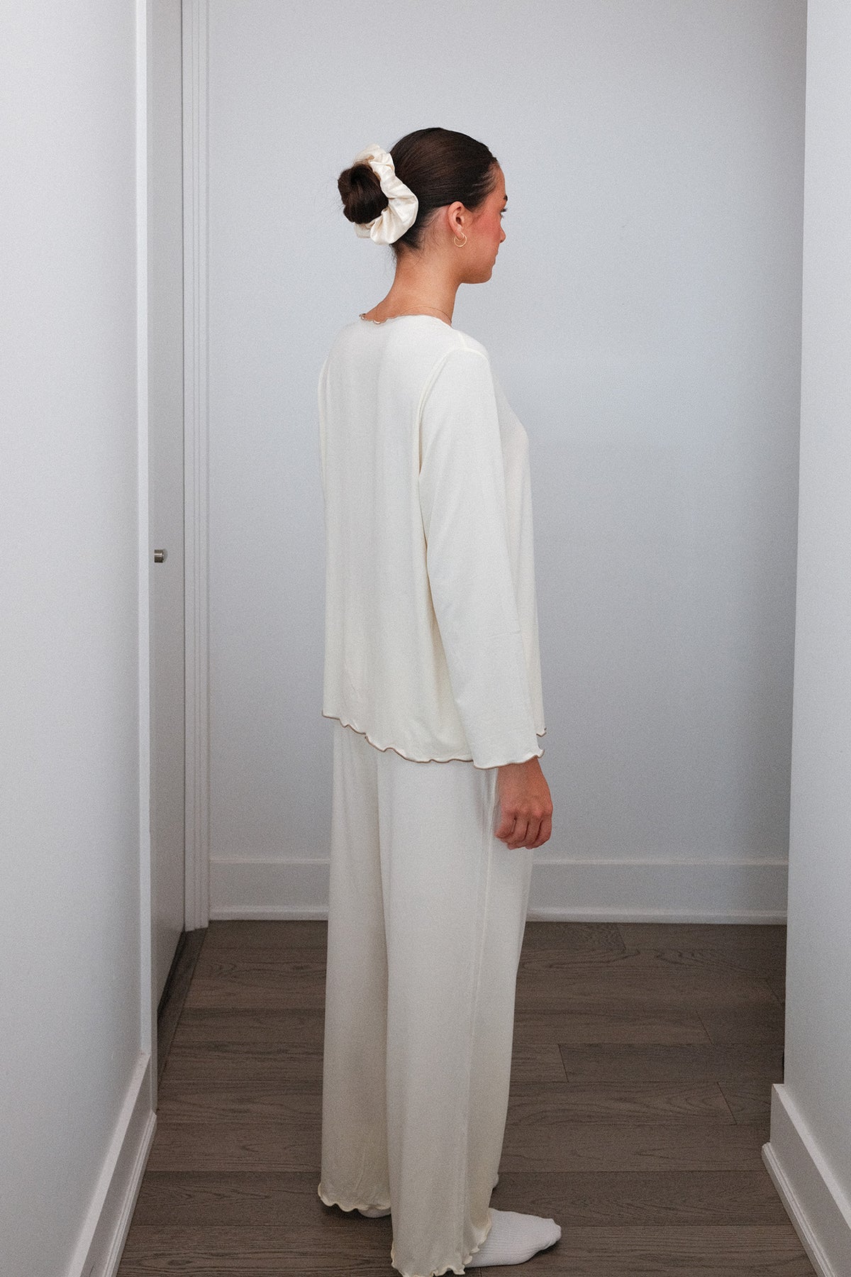 Ruffle Trim Pajama Set in Cream, on model, back three quarter